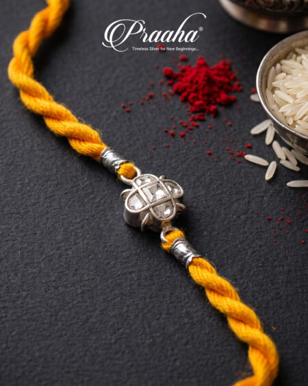 Floral Motif Silver Rakhi