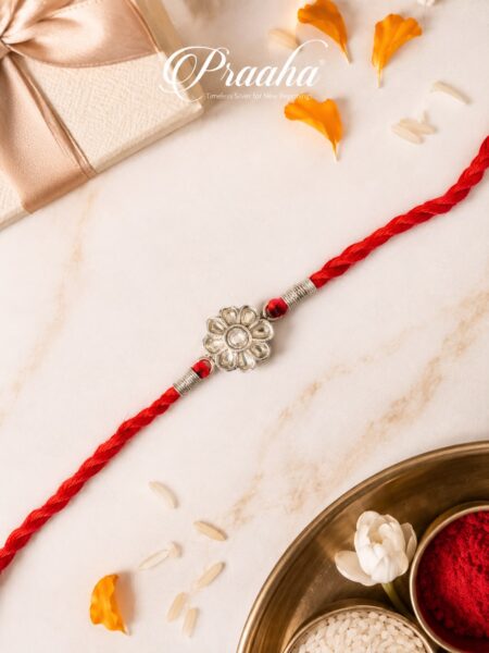 Floral Motif Silver Rakhi