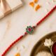 Floral Green-Red Motif Silver Rakhi